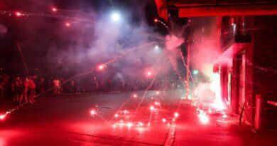 Photos: Protesters clash with police, torch Serbia’s ruling party offices