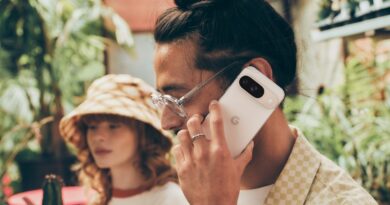 man with cell phone to ear