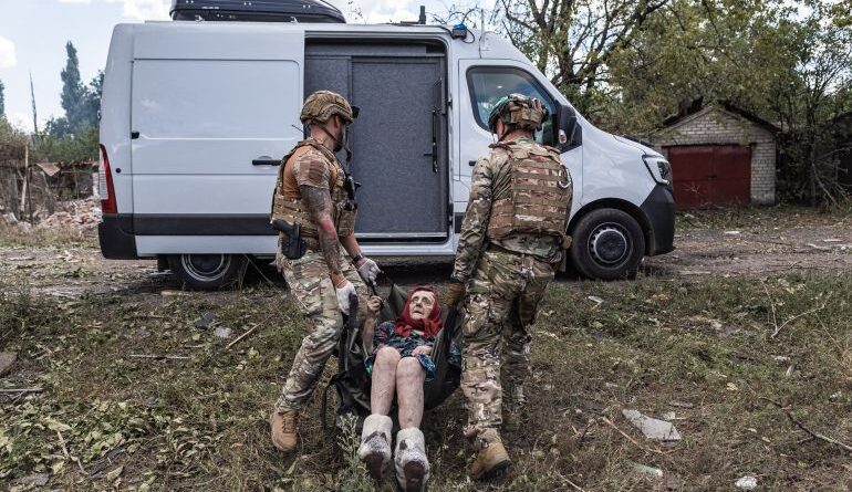 BILYTSKE, UKRAINE - AUG 13: The ‘White Angels’ police group evacuates civilians from the village of Bilytske, following the advance of Russian troops, in the Donetsk Oblast, Ukraine, 13 August 2025. ( Diego Herrera Carcedo - Anadolu Agency )