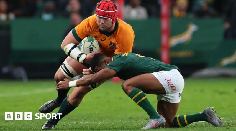 Australia's Harry Wilson is tackled