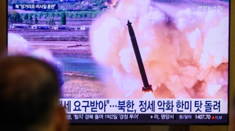 a photo of a tv screen in South Korea showing the broadcast and chryon of a North Korean missile launch.