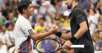 Novak Djokovic and Learner Tien shake hands.
