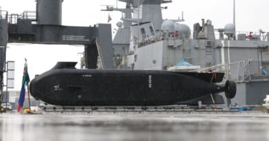 An Anduril Ghost Shark Extra Large Autonomous Undersea Vehicle (XL-AUV) is displayed at the Royal Australian Navy base HMAS Kuttabul, in Sydney, Australia, September 10, 2025. REUTERS/Hollie Adams