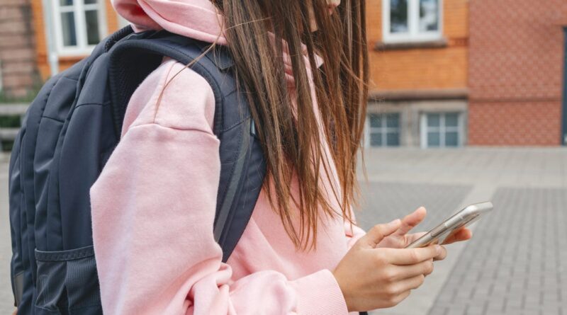 I gave my daughter a cellphone when she was 8. I still don't think they belong in schools.