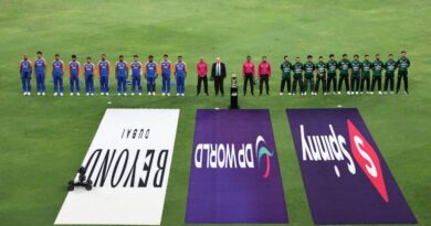 India's (L) and Pakistan's players stand for their national anthems before the start of the Asia Cup 2025 Twenty20 international cricket match between India and Pakistan at the Dubai International Stadium in Dubai on September 14, 2025. (Photo by Fadel SENNA / AFP)