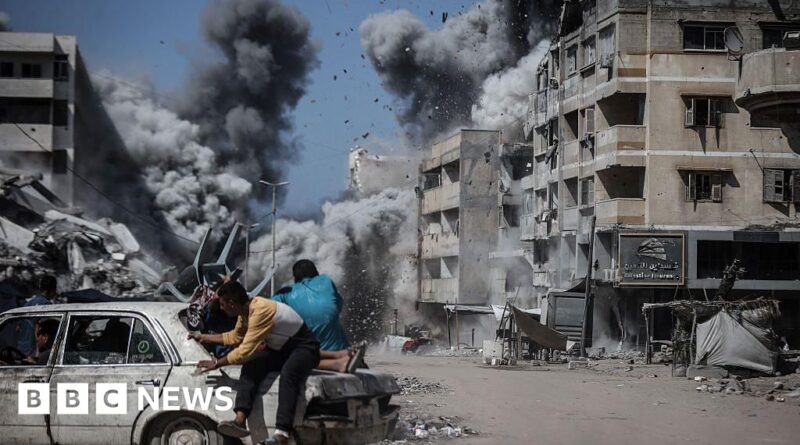 Israeli strikes kill dozens in Gaza including civilians seeking aid, health workers say