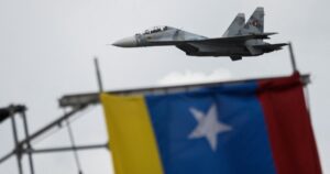 Pentagon warns Venezuela as 2 military aircraft fly near US Navy ship