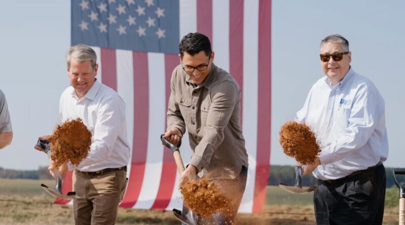 Governor Brian Kemp and Rivian CEO RJ Scaringe break ground at the planned Georgia factory.