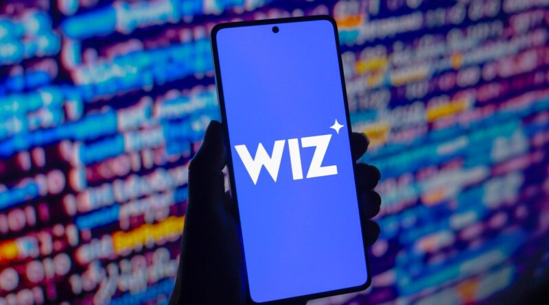 Wiz logo displayed on a smartphone