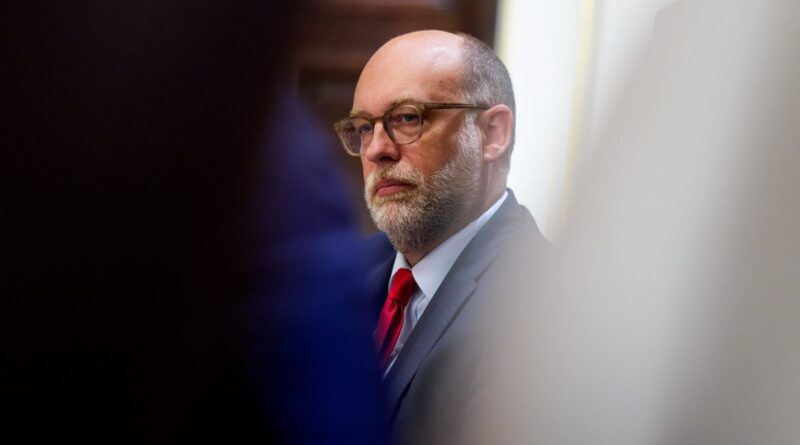 Russell Vought, director of the Office of Management and Budget (OMB), sits in a cabinet meeting.