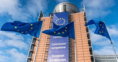 European Union flags waiving in front of Berlaymont building in Brussels