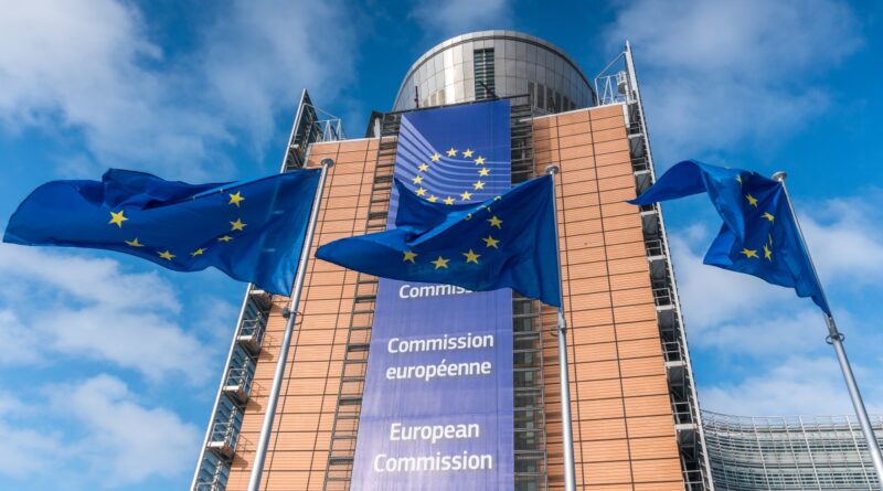 European Union flags waiving in front of Berlaymont building in Brussels