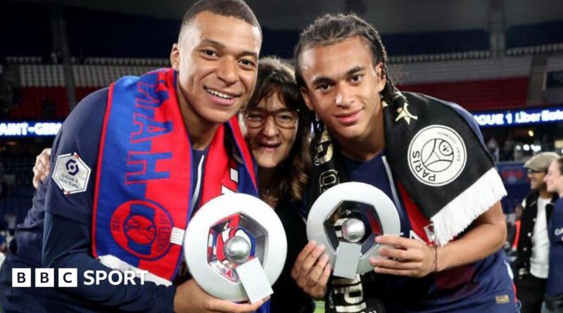 Kylian Mbappe and his brother Ethan along with their mother