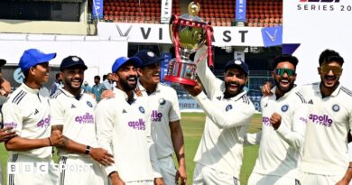 India players celebrate with the trophy