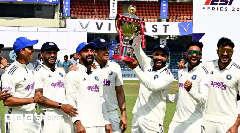 India players celebrate with the trophy
