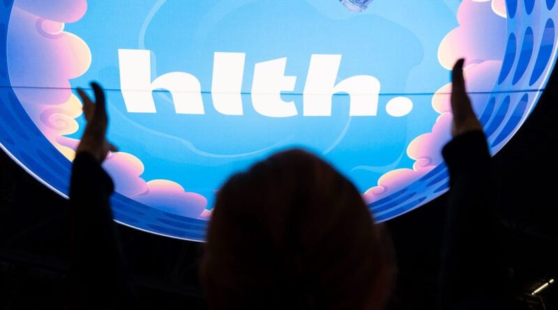 Inside the "Dreamforce of healthcare," where AI hype and fear were hand in hand
