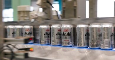 Cans of Asahi Super Dry beer move on the production line inside the Asahi Breweries Ibaraki plant, operated by Asahi Breweries Ltd., a unit of Asahi Group Holdings Ltd., in Moriya, Ibaraki Prefecture, Japan, on Tuesday, April 25, 2023.