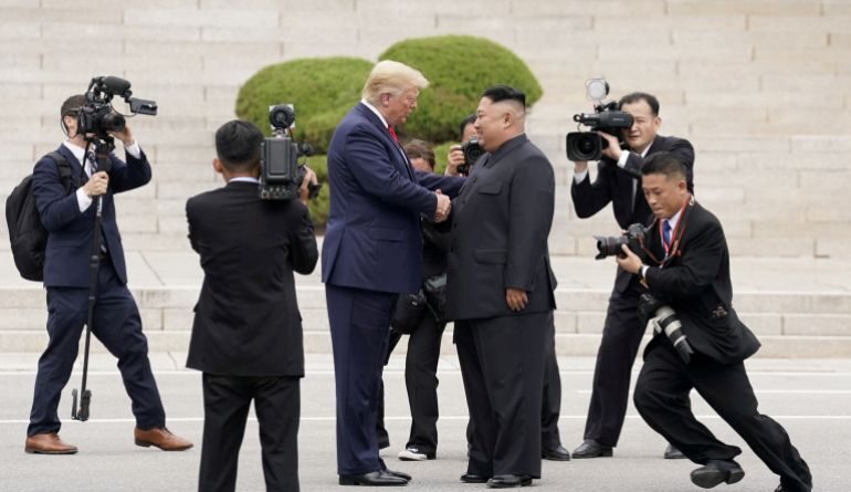 REUTERS PICTURES 40th ANNIVERSARY COLLECTION:  U.S. President Donald Trump meets with North Korean leader Kim Jong Un at the demilitarized zone separating the two Koreas, in Panmunjom, South Korea, June 30, 2019. REUTERS/Kevin Lamarque SEARCH "REUTERS PICTURES 40th ANNIVERSARY COLLECTION" FOR THIS PACKAGE