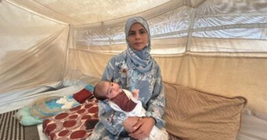 Wiam al-Masri and her baby Samih