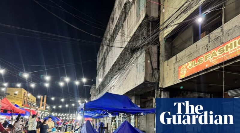 Philippines earthquake: dozens dead as rescuers search through wreckage