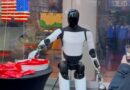 Tesla's Optimus robot hands out candy in Times Square