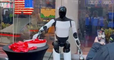 Tesla's Optimus robot hands out candy in Times Square