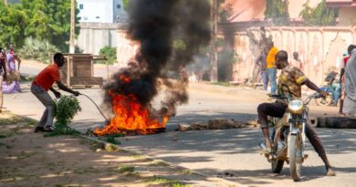 Burning barricades are seen in Garoua during a demonstration by supporters of the political opposition on October 21, 2025 ahead of the release of the results of the presidential vote. (Photo by AFP)