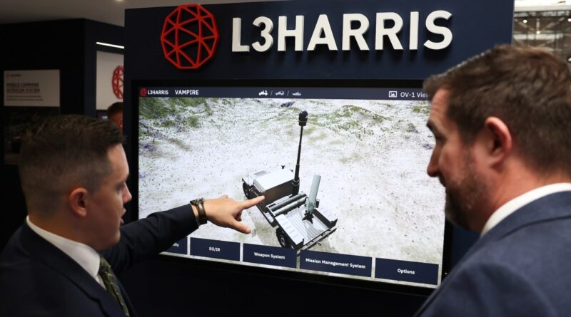 Representatives present a defense system at the L3Harris stand during the 33rd International Defence Industry Exhibition (MSPO) in Kielce, Poland, on September 2, 2025.