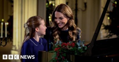 Catherine and Charlotte perform Christmas carol service piano duet