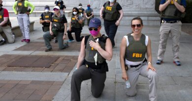 FBI agents allege wrongful termination for kneeling during US protest