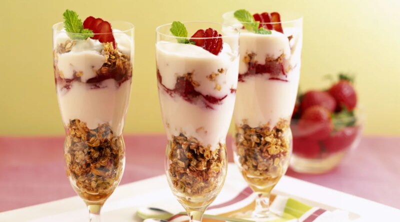 Strawberries and granola yogurt parfaits