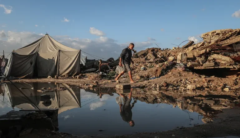 Flooding hits displaced Palestinians’ tents after heavy rain in Gaza