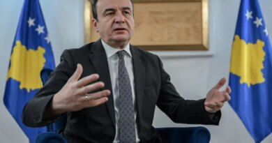 Kosovo's acting Prime Minister and leader of the Vetevendosje (LVV) party, Albin Kurti, gestures as he speaks during an interview with AFP in Pristina on December 24, 2025. Kosovo and Serbia "need to normalise" their relationship, the acting Prime Minister of Kosovo told AFP in an interview just days before legislative elections in which he will put his mandate on the line.