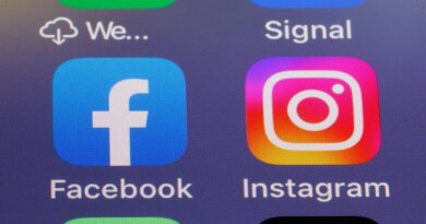 In this photo illustration, the logos of social media applications, Facebook and Instagram are displayed on the screen of an iPhone.