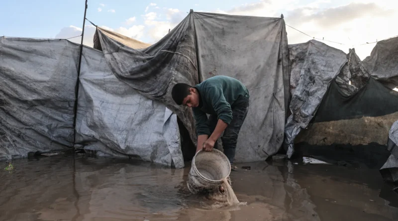 Palestinians suffer flooded tents and debris as cold and rain lash Gaza