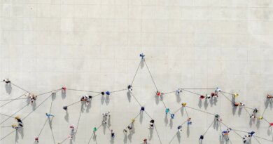 People connected by data points to show a graph.