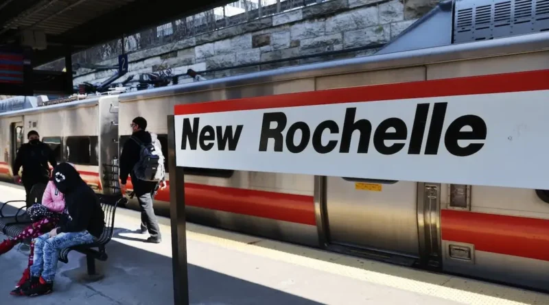 The mayor of this New York City suburb says building apartments on parking lots is keeping rents down