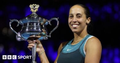 Madison Keys poses with the Australian Open trophy after winning the 2025 title
