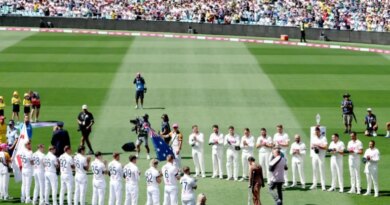 Emergency service personnel and members of the public who responded during a mass shooting at Bondi Beach including Ahmed al Ahmed (R), the man who tackled and disarmed one of the attackers, receive a guard of honour on day one of the fifth Ashes cricket Test match between Australia and England at the Sydney Cricket Ground (SCG) in Sydney on January 4, 2026. England and Australia's cricket teams honoured at the fifth Ashes Test in Sydney on January 4 emergency service personnel and members of the public who responded during a mass shooting at Bondi Beach. (Photo by Glenn NICHOLLS / AFP) / --IMAGE RESTRICTED TO EDITORIAL USE - STRICTLY NO COMMERCIAL USE--