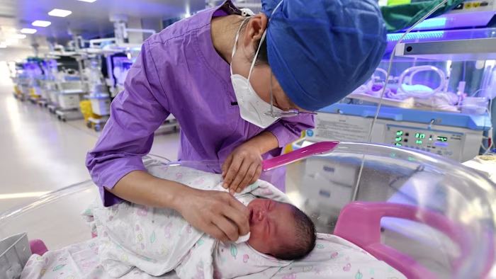 China registers lowest number of births since records began
