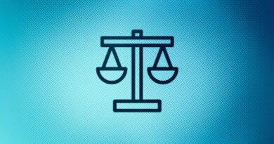 Close up of justice scales icon on screen