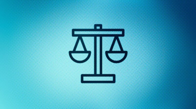 Close up of justice scales icon on screen