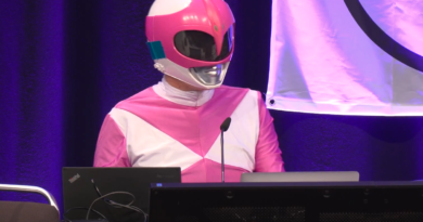 Hacker Martha Root on the stage of the Chaos Communication Congress (39C3) in Hamburg, Germany, an annual cybersecurity conference.