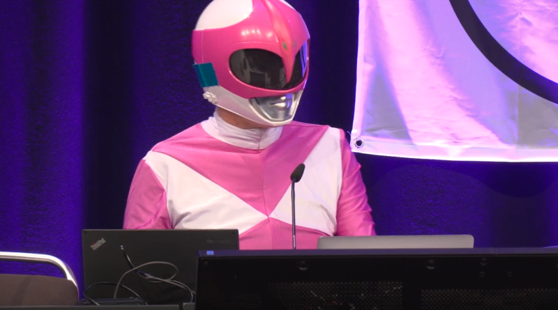 Hacker Martha Root on the stage of the Chaos Communication Congress (39C3) in Hamburg, Germany, an annual cybersecurity conference.