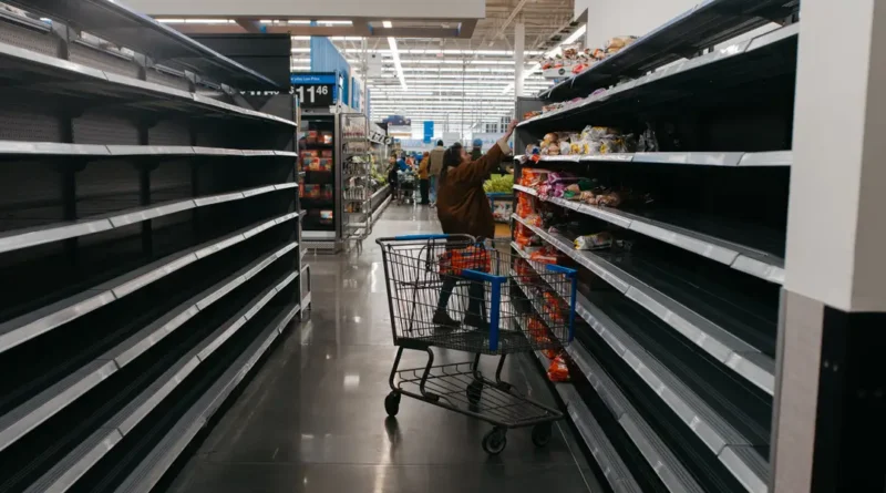 Photos show empty supermarket shelves as millions across the US brace for Winter Storm Fern