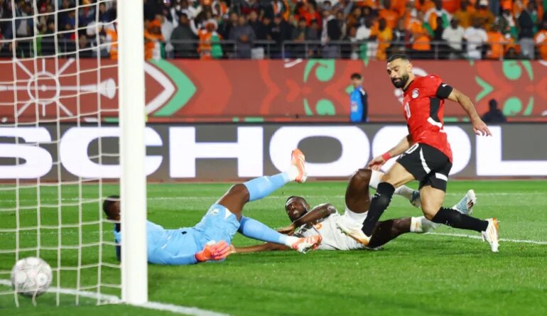 Egypt's Mohamed Salah scores their third goal against Ivory Coast