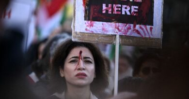 Thousands march in France to back Iranian protesters