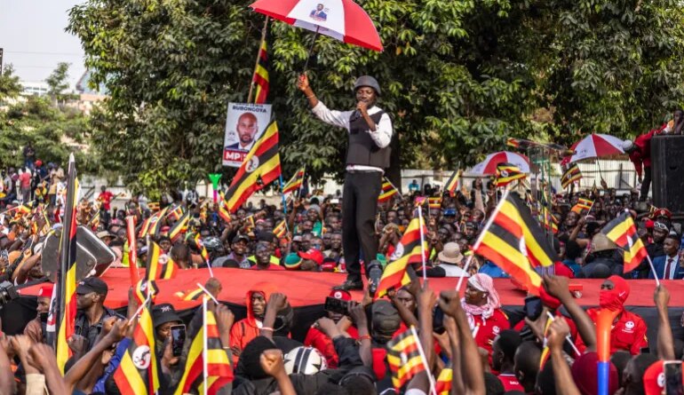Bobi Wine addresses supporters during a rally.
