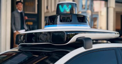 A close up of the rooftop of a Waymo robotaxi that shows sensors.