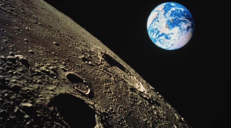 view of Earth with moon surface in foreground